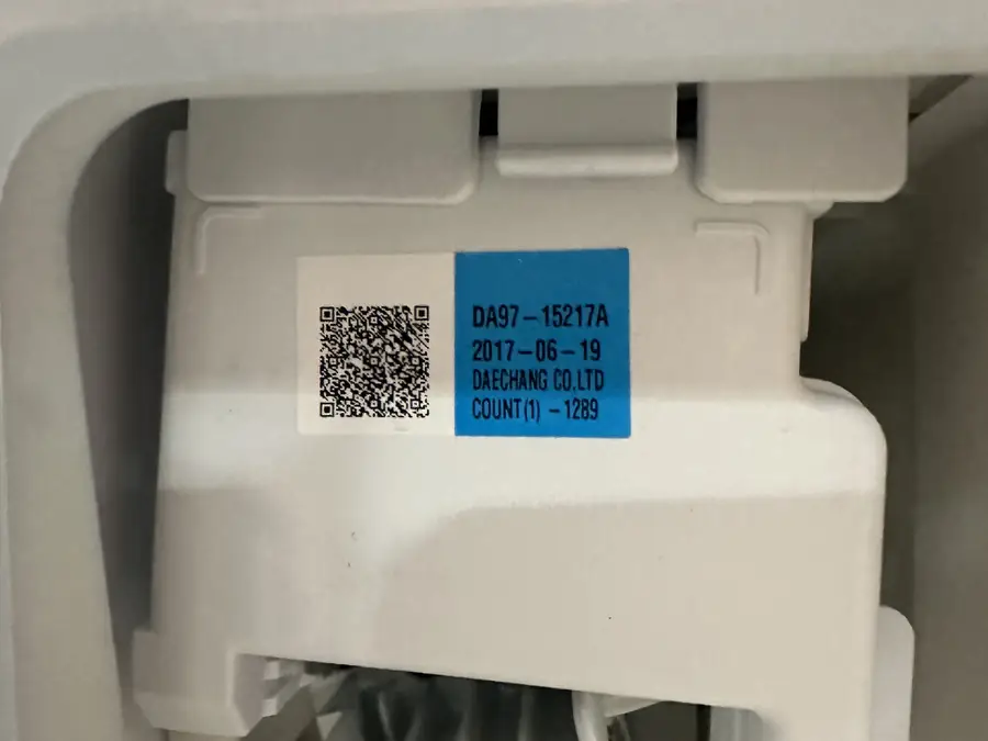 Ice maker module inside a refrigerator door compartment