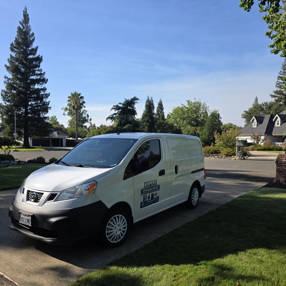 Expert Repair Company appliance repair van parked in a Sacramento-area driveway
